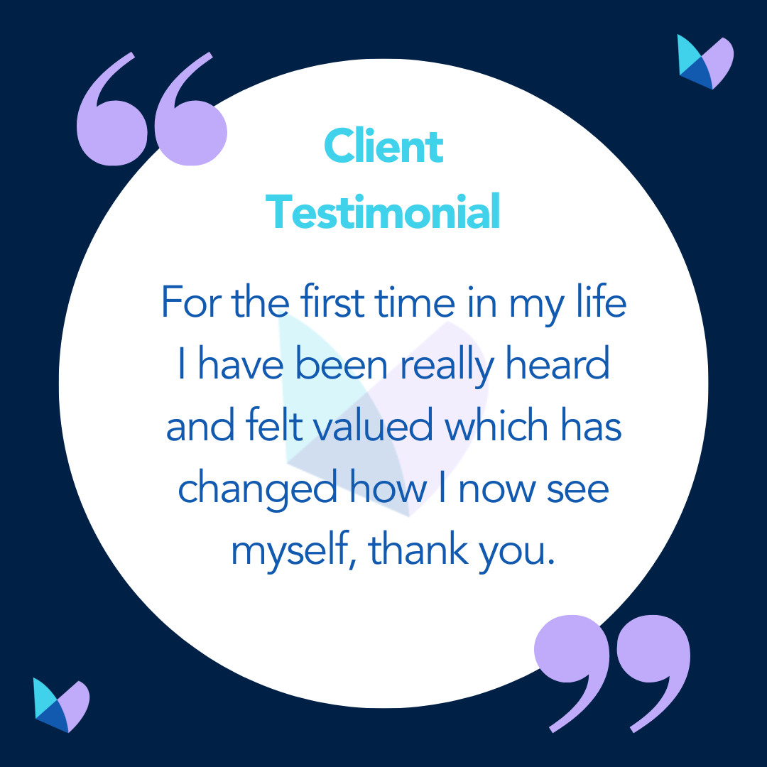 Dark blue background with white circle in the centre, lilac speech marks in the top left and bottom right, and purple and blue butterflies in the top right and bottom left.<br />
Blue text in the white circle reads "Client Testimonial: For the first time in my life I have been really heard and felt valued which has changed how I now see myself, thank you."